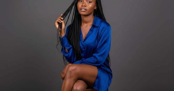 She wears a slightly open silk shirt.